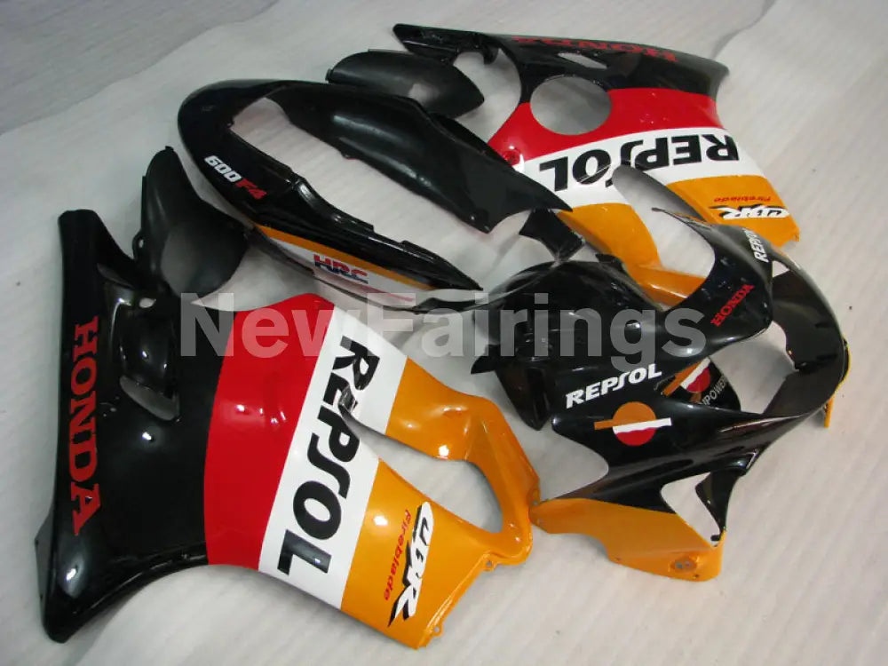 Red and Orange Black Repsol - CBR600 F4 99-00 Fairing Kit -